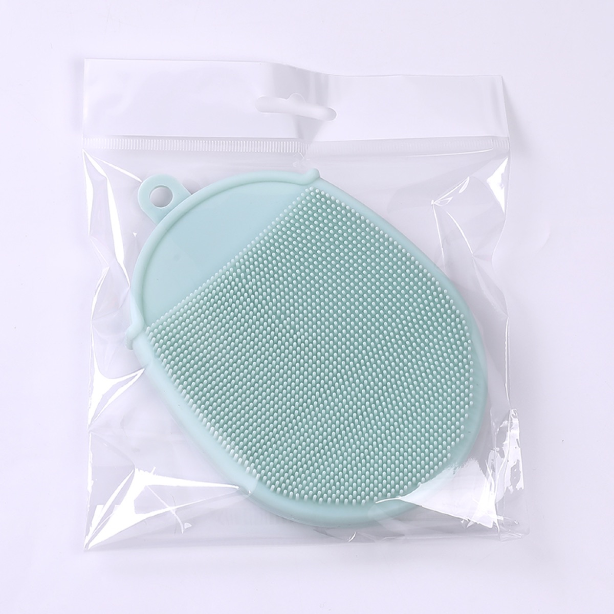 Wearable palm cleansing brush · Mint